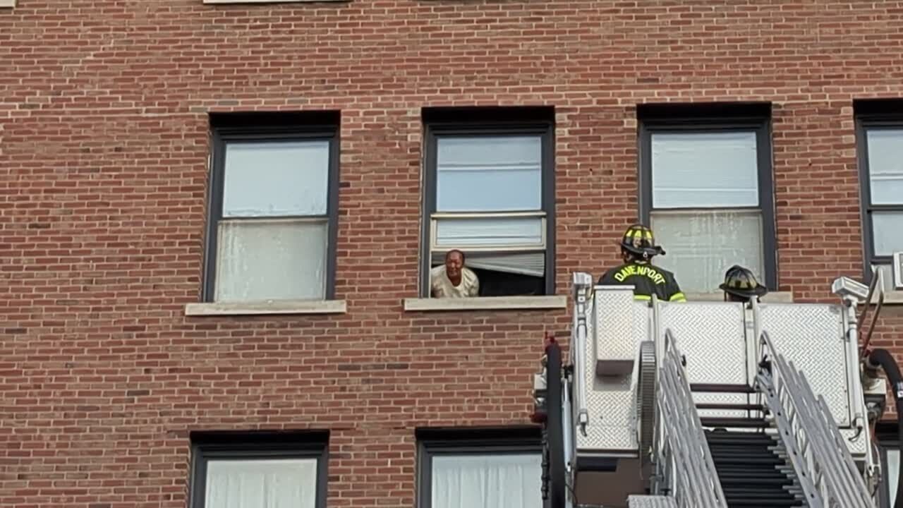Watch now: Woman rescued from Davenport building